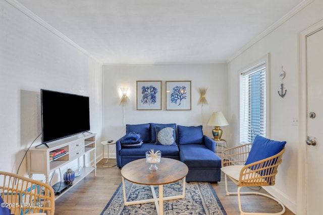 living room with ornamental molding and hardwood / wood-style floors