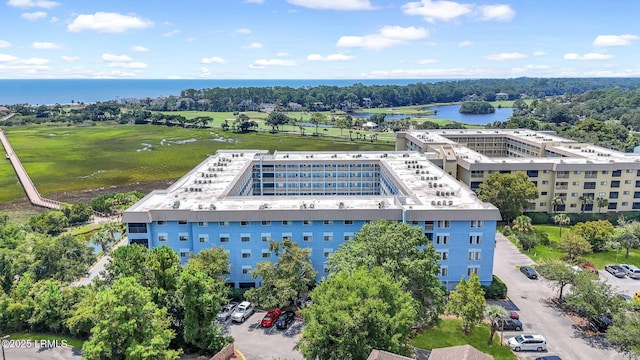 birds eye view of property featuring a water view