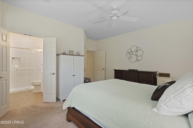 193 Landing Ln, Bluffton, SC 29909 - bedroom featuring light colored carpet, light tile patterned floors, ensuite bathroom, and ceiling fan