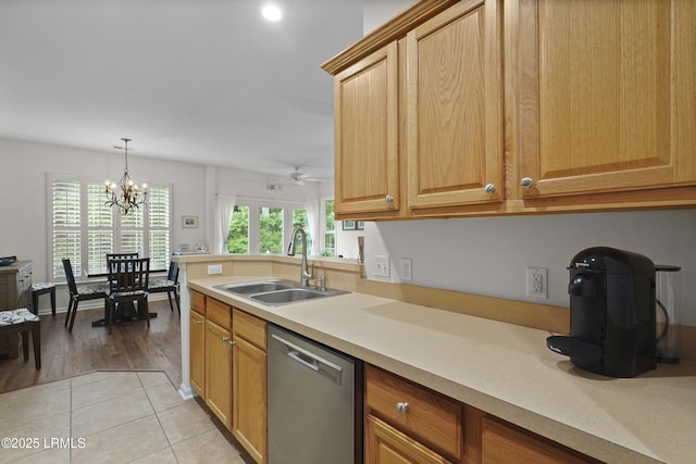 193 Landing Ln, Bluffton, SC 29909 - kitchen with dishwasher, light countertops, a ceiling fan, pendant lighting, and a chandelier
