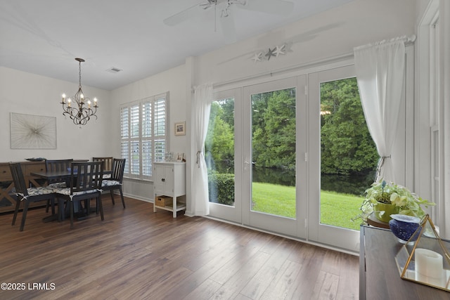 193 Landing Ln, Bluffton, SC 29909 - dining room with wood finished floors, a chandelier, and ceiling fan