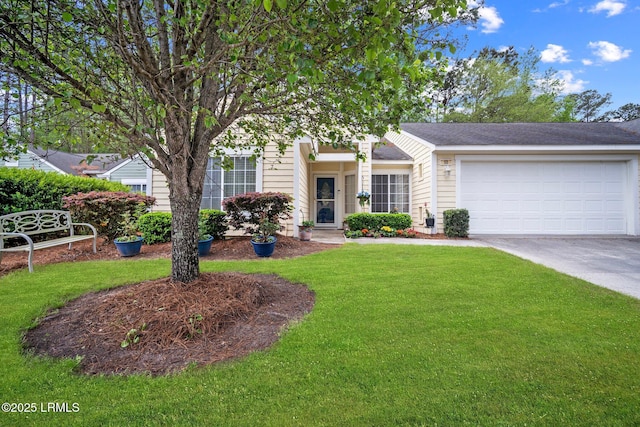 50 Padgett Dr, Bluffton, SC 29909 - view of front of home featuring an attached garage, a front lawn, and concrete driveway
