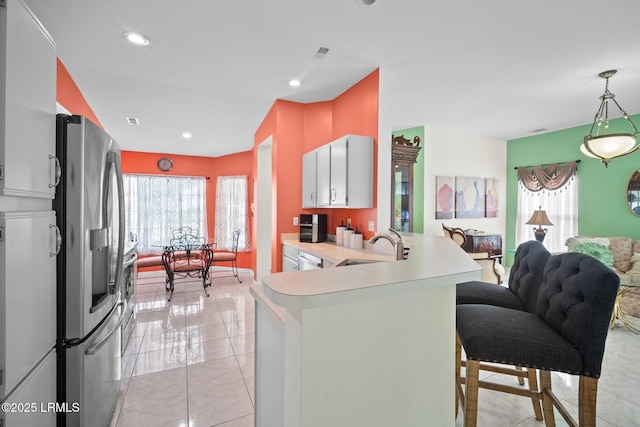50 Padgett Dr, Bluffton, SC 29909 - kitchen with a peninsula, recessed lighting, light countertops, and stainless steel appliances