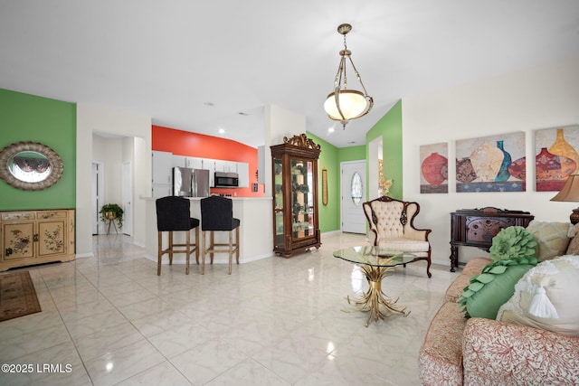 50 Padgett Dr, Bluffton, SC 29909 - living area featuring baseboards and lofted ceiling