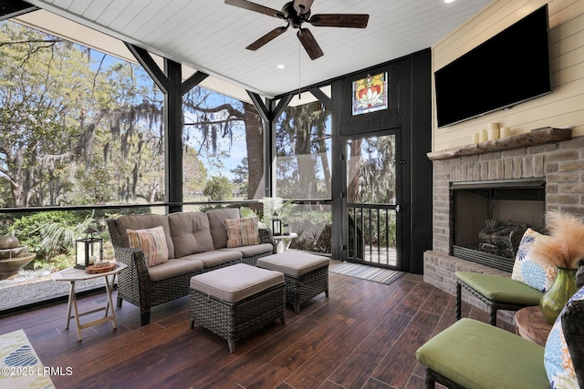 14 Ghost Pony Rd, Bluffton, SC 29910 - sunroom / solarium with a ceiling fan and an outdoor living space with a fireplace