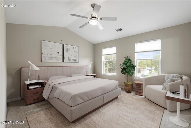 bedroom with vaulted ceiling, light colored carpet, and ceiling fan