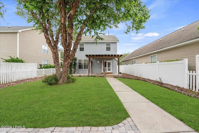 view of front facade featuring a front yard