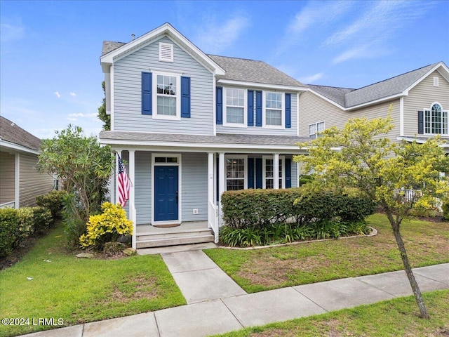 view of front facade featuring a front lawn