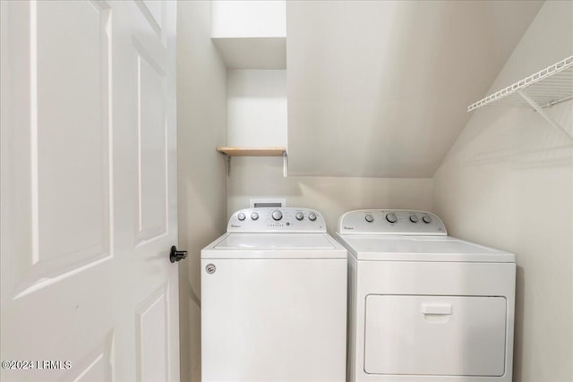 washroom featuring separate washer and dryer