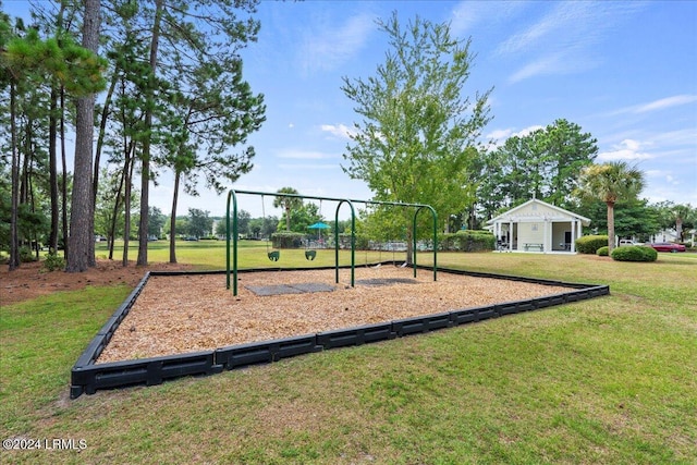 view of play area featuring a lawn