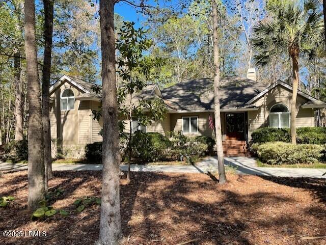 83 Osprey Cir, Okatie, SC 29909 - view of front facade with a chimney