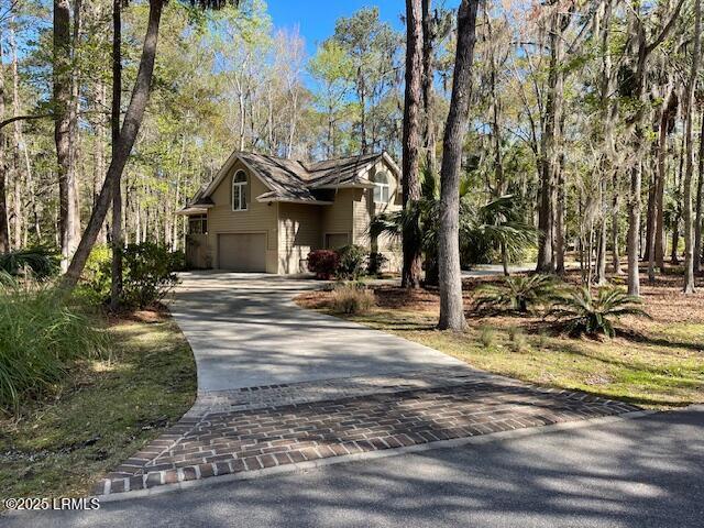 83 Osprey Cir, Okatie, SC 29909 - view of front of property with an attached garage and concrete driveway