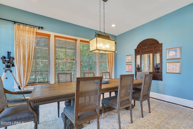 dining space with recessed lighting and baseboards