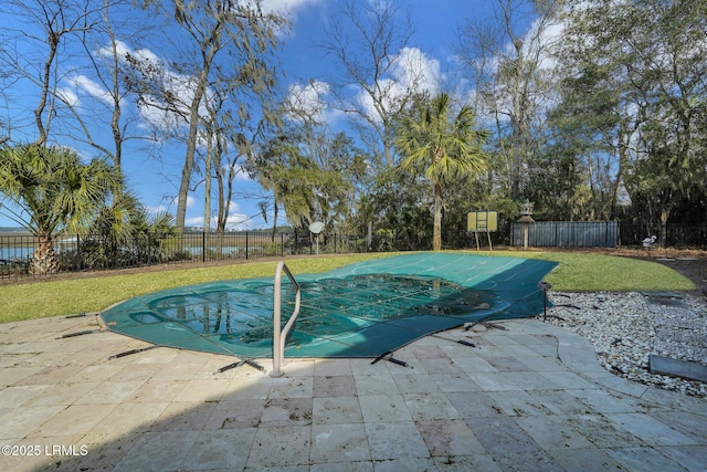 view of pool with a patio, fence, and a fenced in pool