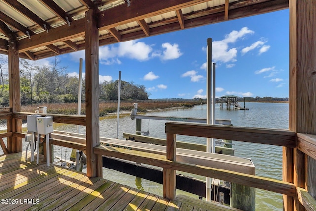 view of dock with a water view and boat lift