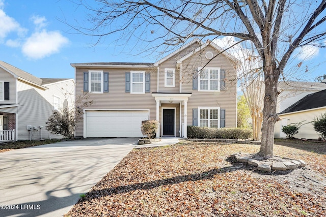 front of property featuring a garage