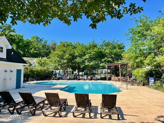 522 Candida Dr, Beaufort, SC 29906 - community pool featuring a pergola and a patio