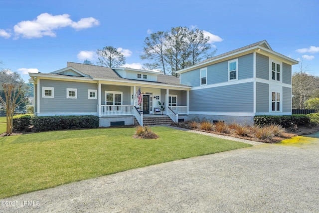 view of front of home featuring covered porch and a front yard