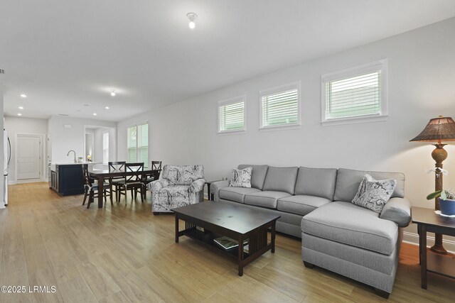 821 Aurora Way, Bluffton, SC 29909 - living area featuring light wood finished floors and recessed lighting