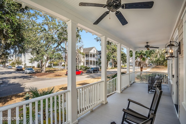 view of patio / terrace with ceiling fan and a porch