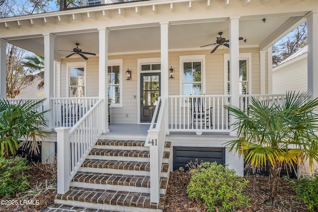 doorway to property with ceiling fan and a porch