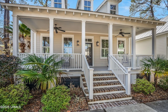 entrance to property with ceiling fan and covered porch