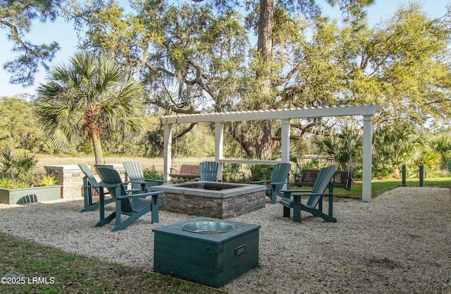 view of patio with an outdoor fire pit