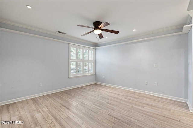 empty room with ornamental molding, ceiling fan, and light wood-type flooring