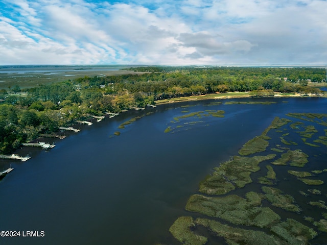 drone / aerial view with a water view