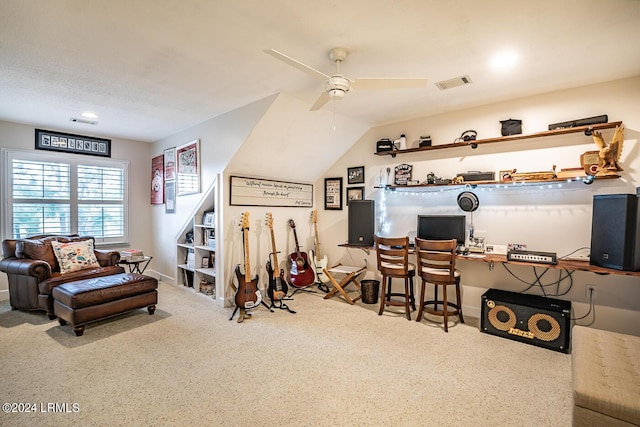 interior space with vaulted ceiling and ceiling fan