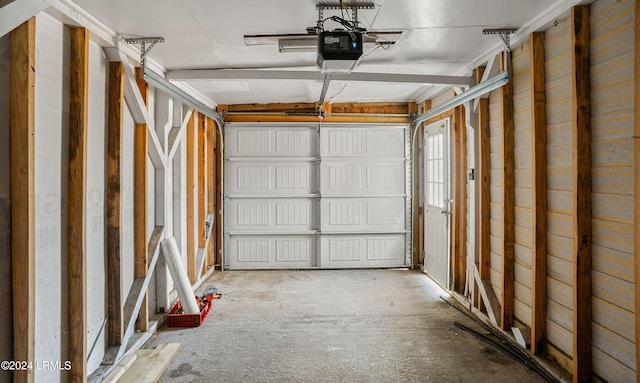 garage featuring a garage door opener