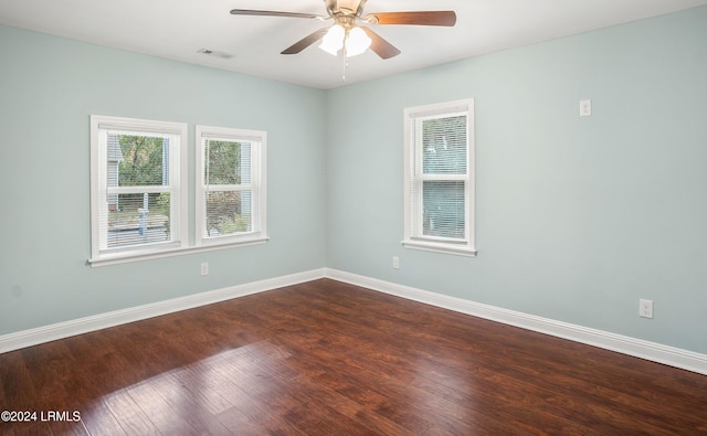 unfurnished room featuring hardwood / wood-style floors and ceiling fan