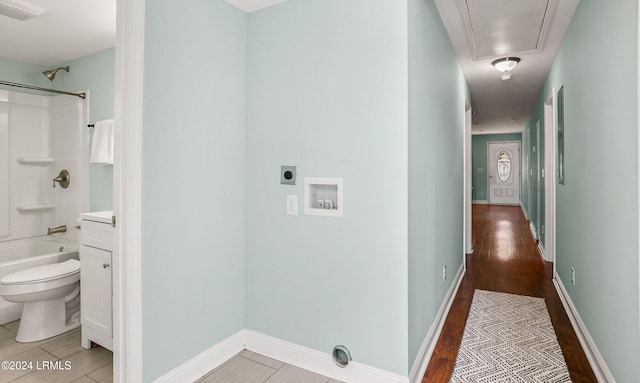 hallway featuring wood-type flooring