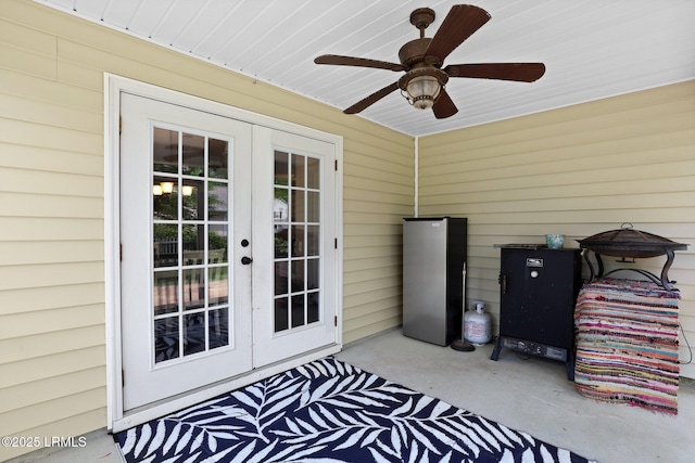view of patio / terrace featuring french doors and ceiling fan