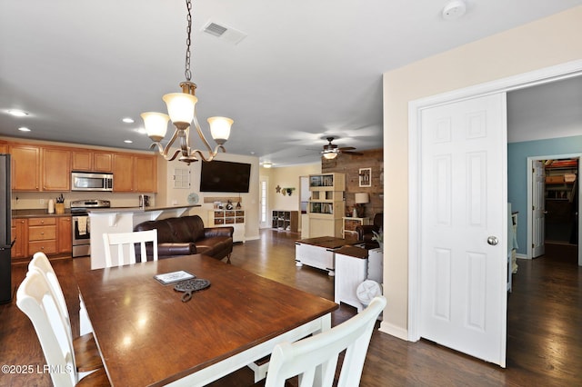 dining area with visible vents, baseboards, ceiling fan with notable chandelier, dark wood-style floors, and recessed lighting