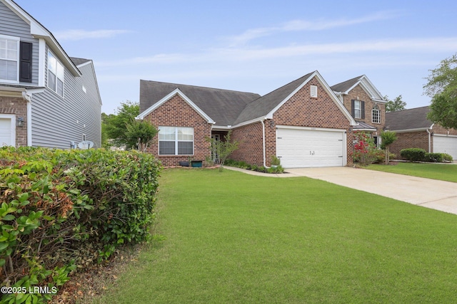 view of front of house with brick siding, a garage, driveway, and a front yard