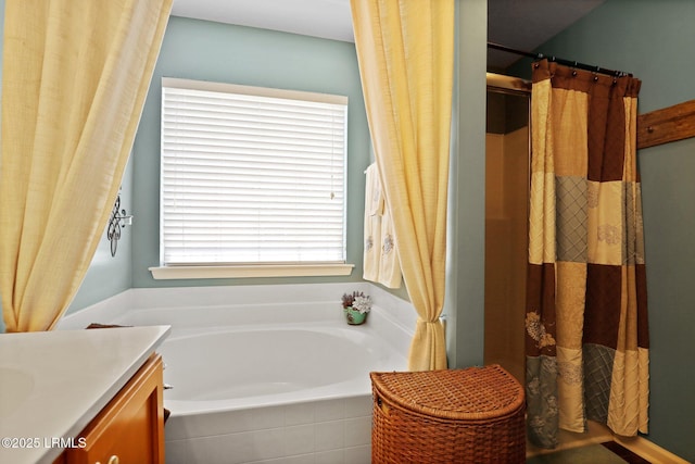 full bath with a garden tub, a shower with curtain, and vanity