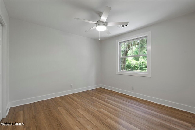 1807 Battery Park Dr, Port Royal, SC 29935 - spare room featuring light wood-style flooring and ceiling fan
