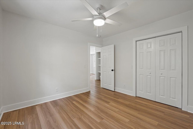 1807 Battery Park Dr, Port Royal, SC 29935 - unfurnished bedroom with light wood finished floors, a closet, and a ceiling fan