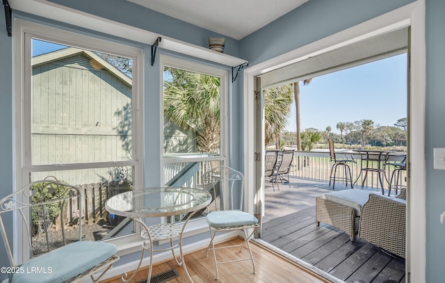 sunroom / solarium with visible vents