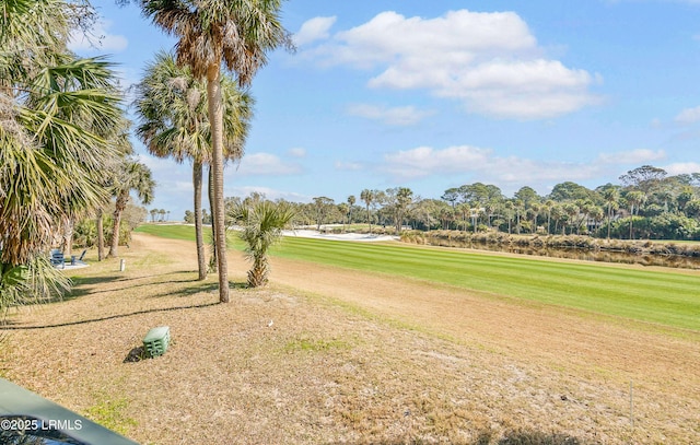 surrounding community with a yard