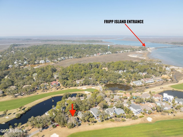 bird's eye view featuring a water view and golf course view