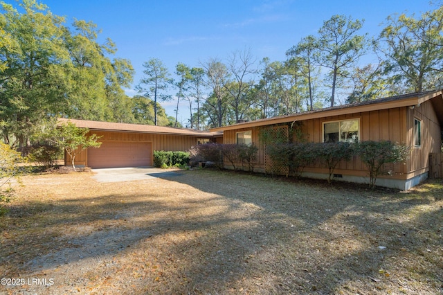 ranch-style home with a garage