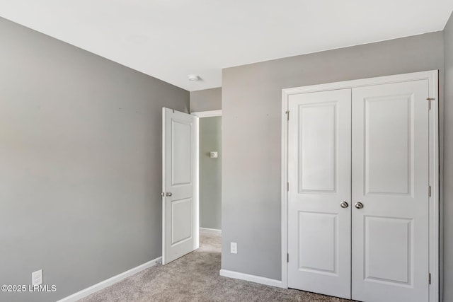 238 Turkey Oak Dr, Bluffton, SC 29910 - unfurnished bedroom featuring baseboards, a closet, and light carpet