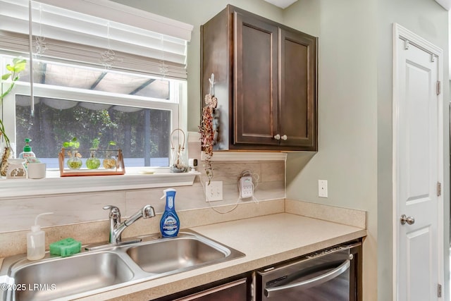 238 Turkey Oak Dr, Bluffton, SC 29910 - kitchen with a sink, tasteful backsplash, stainless steel dishwasher, dark brown cabinetry, and light countertops