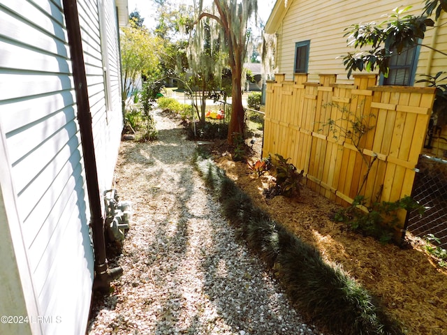 view of yard with central air condition unit