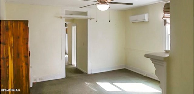 empty room with ceiling fan and a wall mounted AC