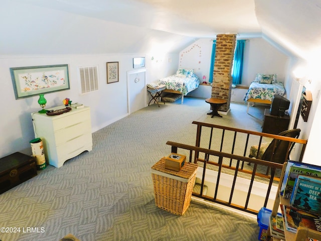 bedroom featuring vaulted ceiling and dark colored carpet