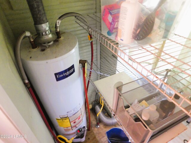 utility room featuring gas water heater