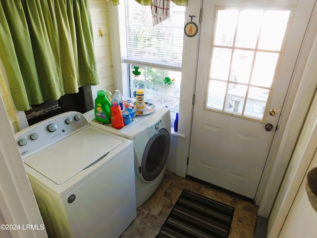 washroom with washer and dryer